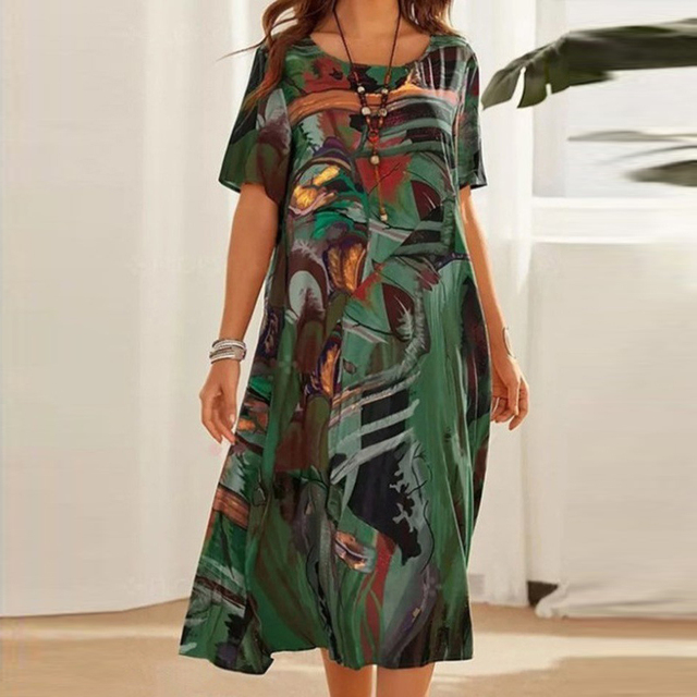 Serafina | Elegantsed midi kleit abstraktse mustriga